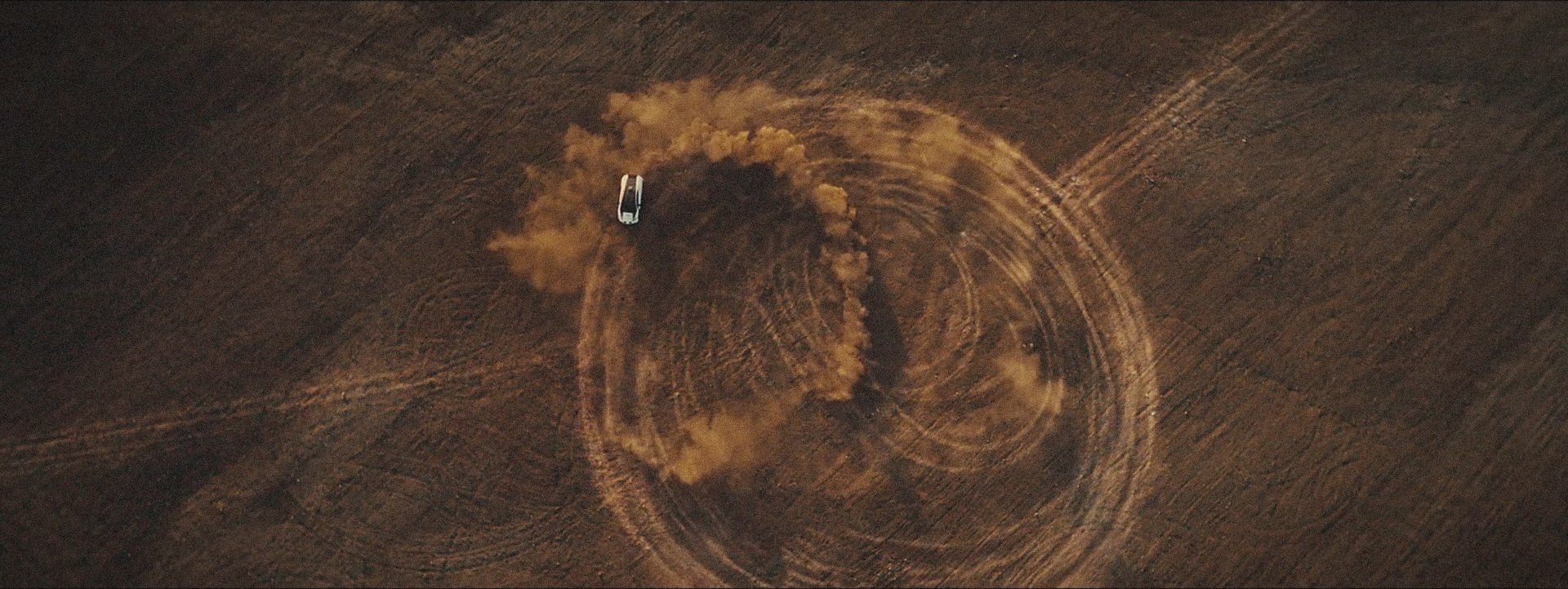 Lamborghini Huracán Sterrato tracing circles in the dust